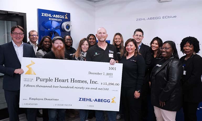 Donation check of ZIEHL-ABEGG Inc. to Puple Heart Homes Inc.